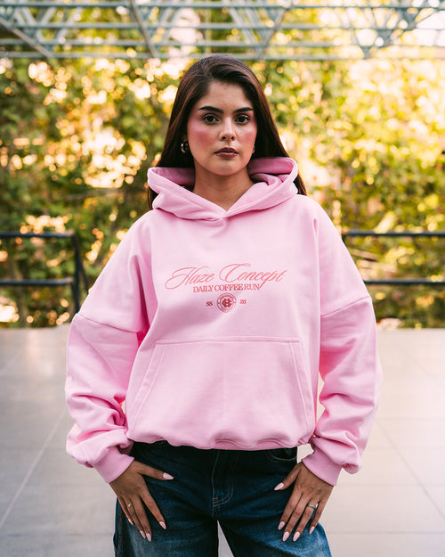 Polerón/Hoodie boxy fit pink con diseño coffee run delantero