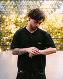 Polera tejida Date Night Black con bordado amarillo Haze delantero