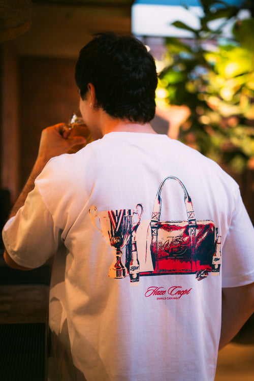 Polera boxy fit blanca con estampado After Game espalda