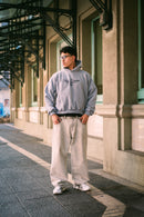Polerón/Hoodie boxy fit gris melange con diseño coffee run delantero
