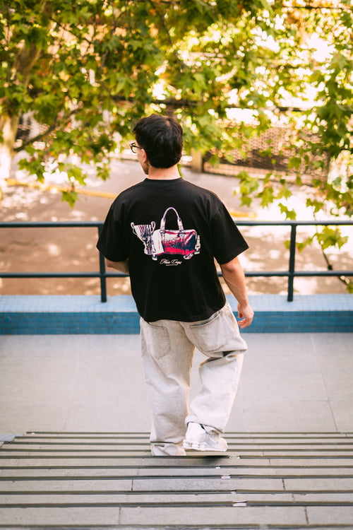 Polera boxy fit negra con estampado After Game espalda