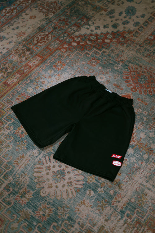 Short de buzo negro con doble bordado delantero