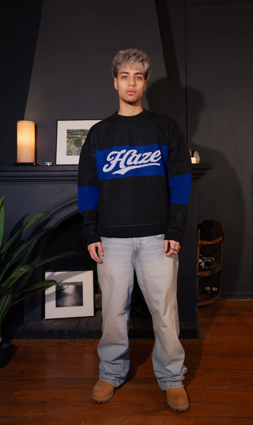 Sweater / Chaleco tejido en color negro con diseño en el frente