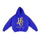Boxy Fit Hoodie "Signature" Azul Royal con estampando en la espalda de una HC