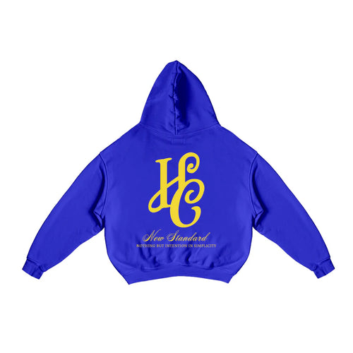 Boxy Fit Hoodie "Signature" Azul Royal con estampando en la espalda de una HC